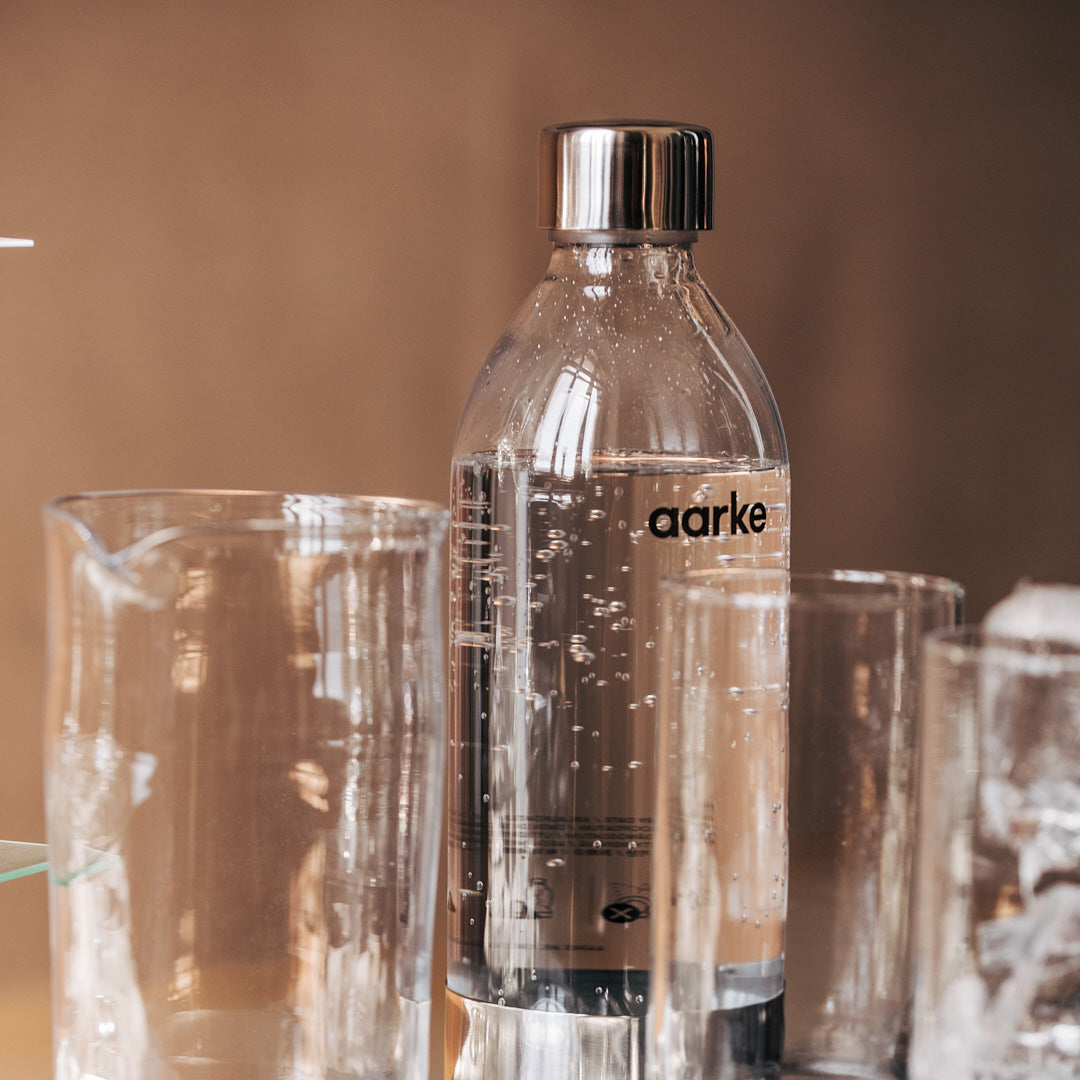 An Aarke PET Bottle full of sparkling water.