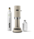 Front view of Aarke Carbonator Pro Sand, accompanied by a CO2 gas cylinder and a glass bottle filled with sparkling water.