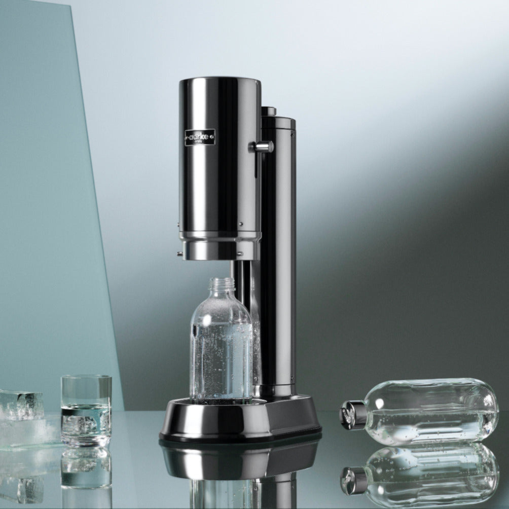 The Aarke Carbonator Pro in Stainless Steel with the Glass Bottle for the Carbonator Pro.