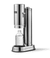 Aarke Carbonator Pro in Stainless Steel. Side view with chamber open and glass bottle inside.