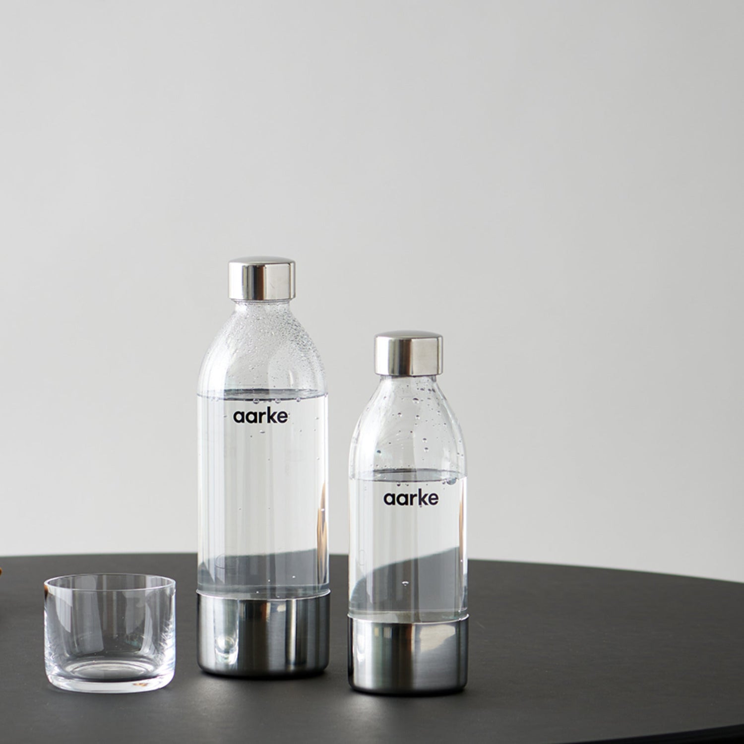Two Aarke PET Bottles. One in each size.