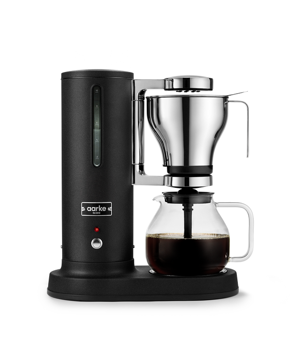 Aarke Matte Black coffee maker with glass carafe on a white background