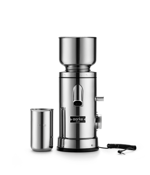 Aarke Coffee Grinder in Stainless Steel with stainless steel coffee grounds cup and autogrind cord for connection with the Aarke Coffee Maker.