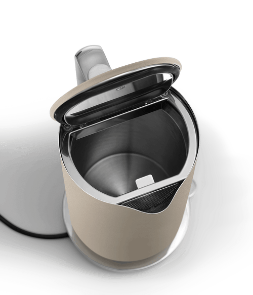 Top view of the AARKE electric kettle in Sand with the lid open, showing the stainless steel interior and spout filter.