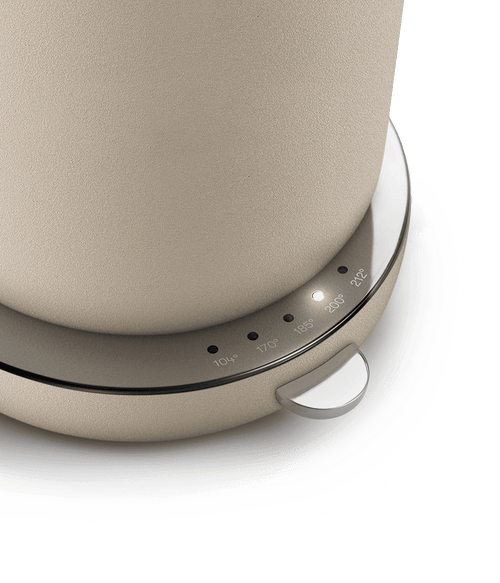 Detail of AARKE Kettle Sand temperature control base with adjustable heat settings and stainless steel accents.