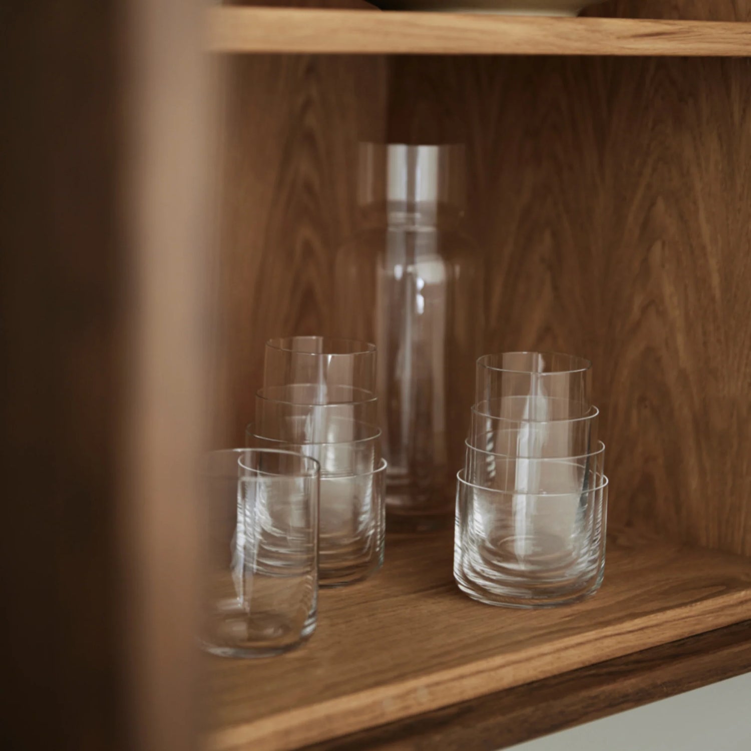 Aarke Glassware Nesting Glasses sit nested on a shelf.