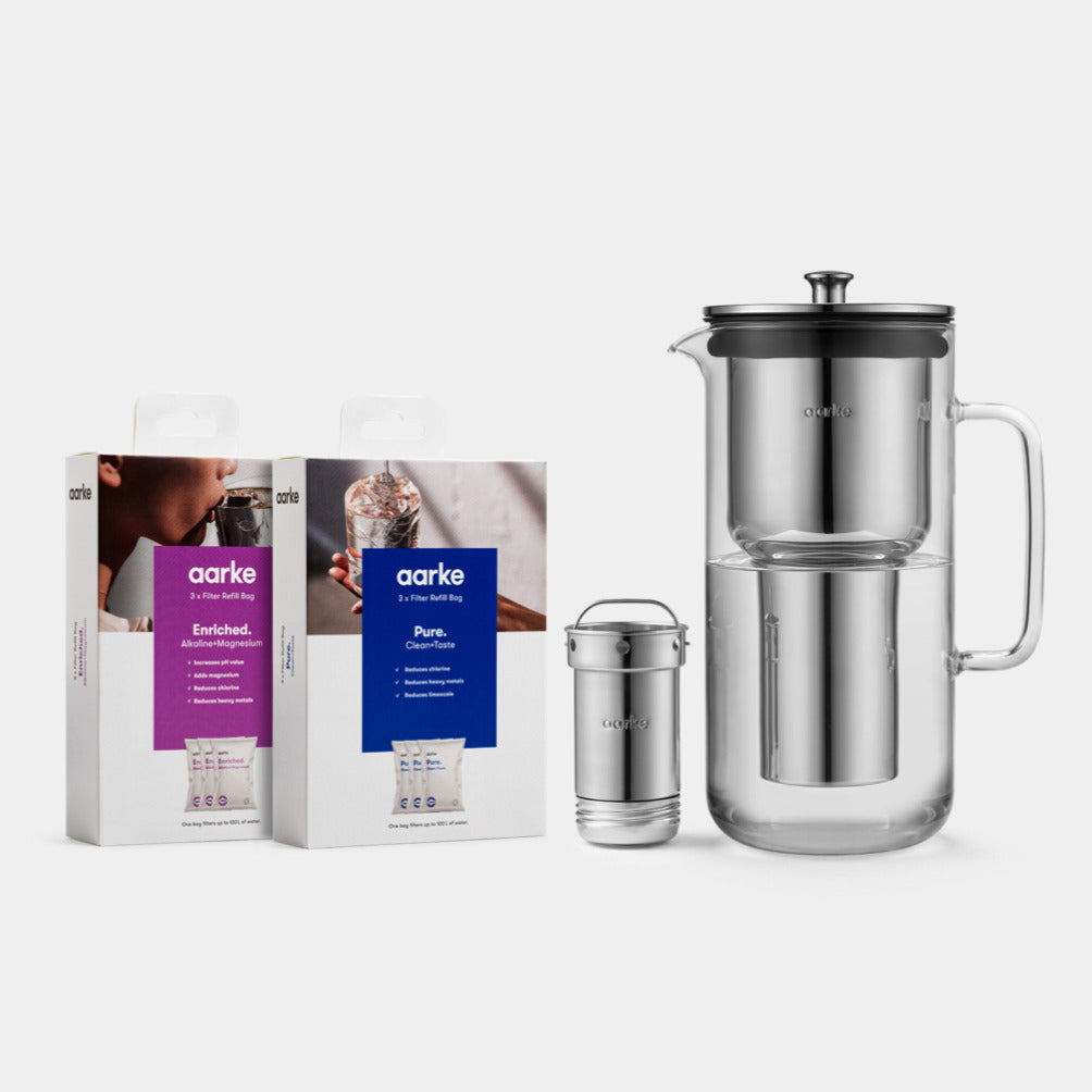 Aarke Water Purifier Pitcher pictured with Pure Filter Granules and Enriched Filter Granules.