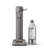 Front view of the Aarke Carbonator 3 in Matte Grey next to a PET water bottle.