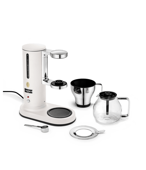 Aarke Matte White automatic pour-over coffee maker with stainless steel filter cone, glass coffee carafe and measuring scoop – premium Scandinavian drip coffee brewer.