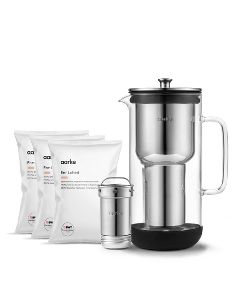 Aarke Water Purifier with three Enriched Filter Granules refill bags for alkaline, magnesium-mineralised water.