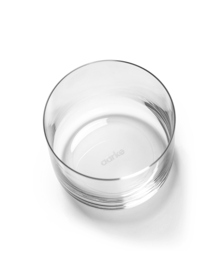 A view from above of one glass showing the etched Aarke logo.