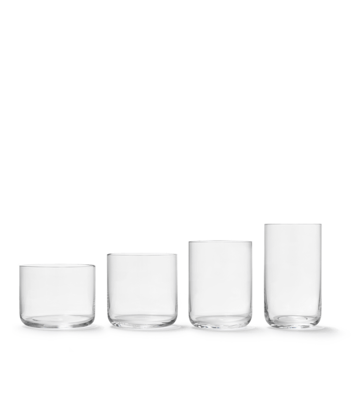 A lineup of four Aarke drinking glasses in ascending height, showcasing the different available sizes.