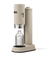Aarke Carbonator Pro in Sand. Side view with chamber open and Glsas Bottle sitting inside/