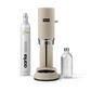 Aarke Carbonator Pro in Sand with 1 Aarke CO2 Cylinder and 1 Glass Bottle.