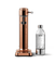 Aarke Carbonator 3 in Copper displayed with a PET water bottle.