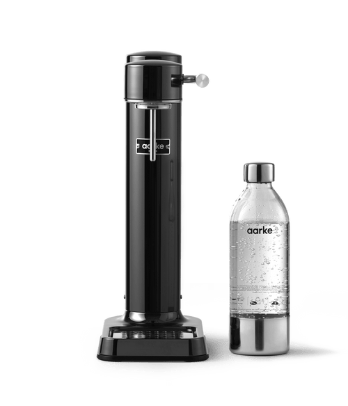 Front view of Aarke Carbonator 3 in Black Chrome next to a PET water bottle.