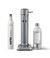 Front view of the Carbonator 3 in Hammertone beside a PET water bottle and 1 Aarke CO2 Cylinder.