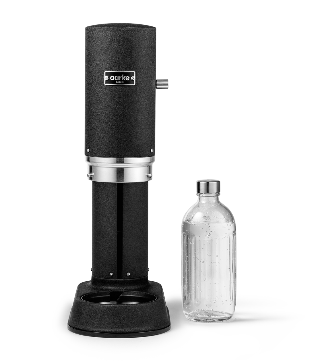 Aarke Carbonator Pro in Matte Black. Front view with chamber open and Glass Bottle sitting beside.