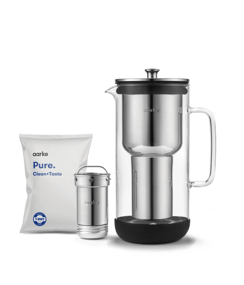 Aarke purifier with a bag of Pure Filter Granules.